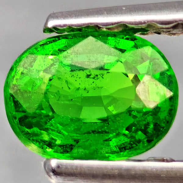 Natural Green Tsavorite Garnet 0.51 Ct. Oval Shape 5.1 x 3.8 Mm Gemstone From Tanzania: Product ID: 802937053 Product Name: Natural Tsavorite Weight: 0.51 CT. Size: 5.1 x 3.8 x 2.8 MM. Shape: Oval Shape Color: Green Clarity:SI1 Luster: Good Gems Origin: Tanzania Treatment: Unheated Cryst