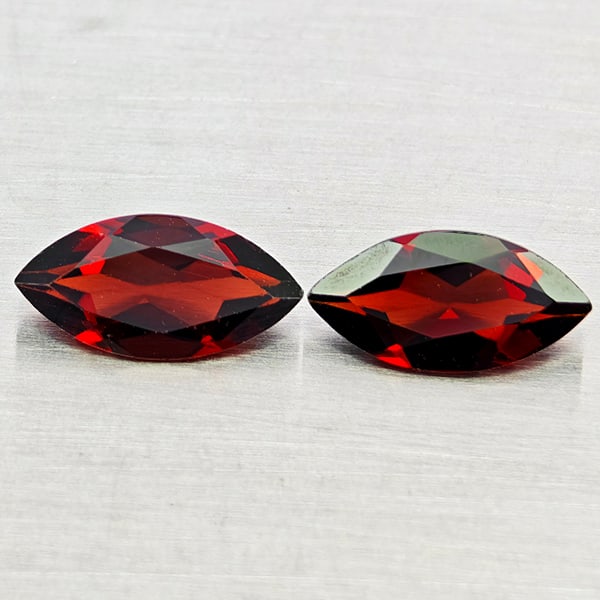 Natural Orangish Red Garnet 2.04 Ct. 2 Pcs Marquise Shape 4.9 x 10 Mm. Gemstones from Tanzania: Product ID: 802936991 Product Name: Natural Garnet Weight: 2.04 CT. Size: 4.9 x 10 x 2.8 MM. Shape: Marquise Shape Color: Orangish Red Clarity:VVS - VSI Luster: Good Gems Origin: Tanzania Treatment: U