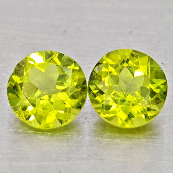 Natural Green Peridot 1.93 Ct. 2 Pcs Round Shape 6.1 Mm Gemstones from Pakistan: Product ID: 805317488 Product Name: Natural Rhodolite Weight: 1.93 CT. Size: 6.1 x 6.1 x 3.6 MM. Shape: Round Color: Green Clarity:VSI Luster: Good Gems Origin: Pakistan Treatment: Unheated Crystal St