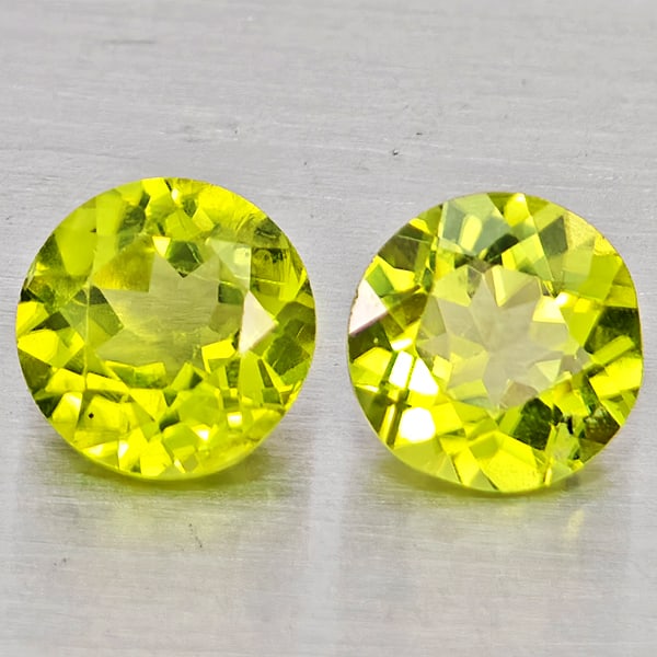 Natural Green Peridot 1.74 Ct. 2 Pcs Round Shape 5.8 Mm Gemstones from Pakistan: Product ID: 805317429 Product Name: Natural Rhodolite Weight: 1.74 CT. Size: 5.8 x 5.8 x 3.7 MM. Shape: Round Color: Green Clarity:VSI Luster: Good Gems Origin: Pakistan Treatment: Unheated Crystal St