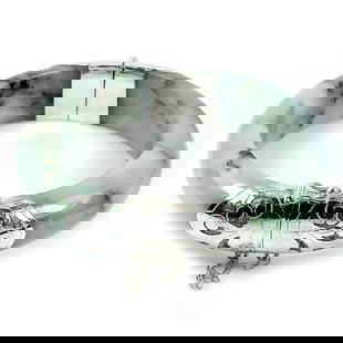 Natural Green Jade Bangle 400 Ct. with Silver Diameter 60 Mm. Gemstone From Thailand: Product ID: 819814070 Product Name: Natural Jade Weight: 400.00 CT. Size: 78 x 60 x 16 MM. Shape: Round Cabochon Color: Green Clarity:Opaque Luster: Good Gems Origin: Thailand Treatment: Unheated Crys