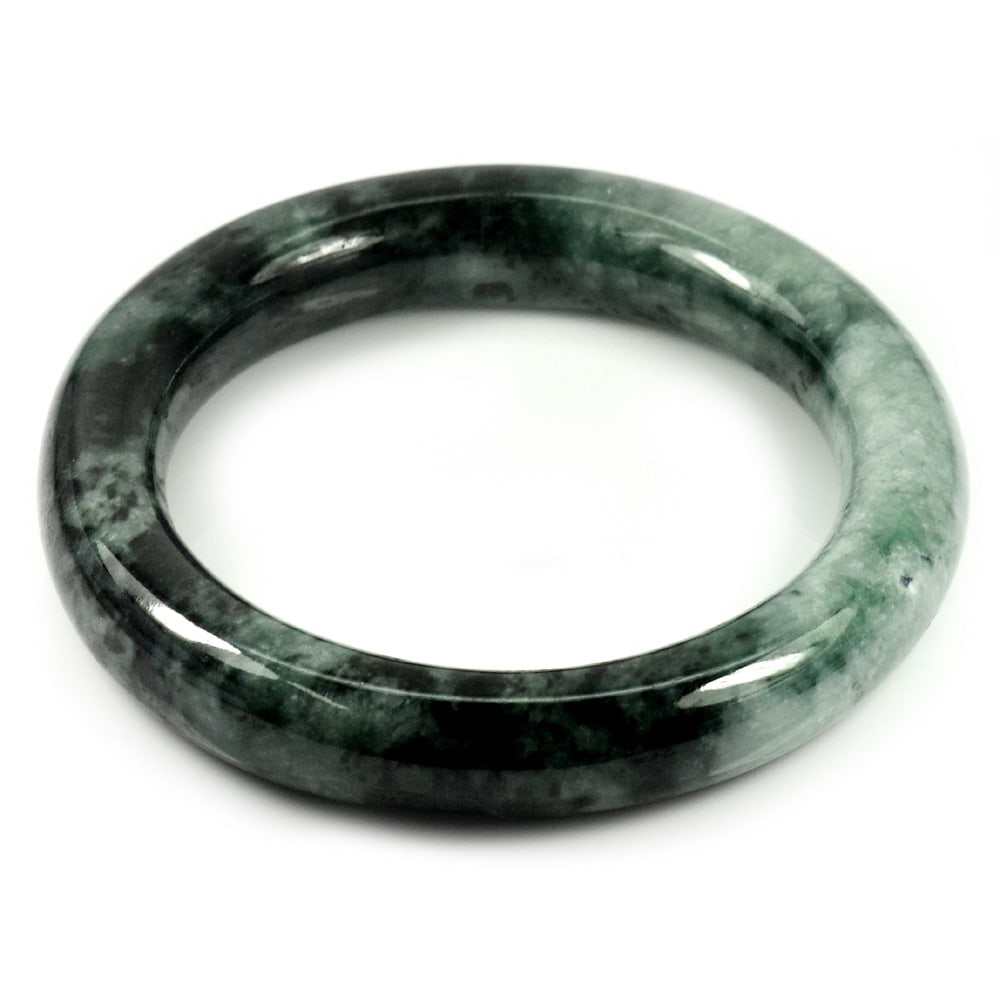 Natural Green Jade Bangle 351.13 Ct. Diameter 57 Mm. Gemstone from Thailand: Product ID: 819815162 Product Name: Natural Jade Weight: 351.13 CT. Size: 76 x 57 x 12 MM. Shape: Round Cabochon Color: Green Clarity:Opaque Luster: Good Gems Origin: Thailand Treatment: Unheated Crys