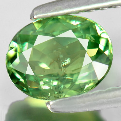 Natural Demantoid Garnet 0.92 Ct. Oval Shape 6.9 x 5.3 Mm. Unheated Gemstone From Madagascar: Product ID: 802922055 Product Name: Natural Demantoid Weight: 0.92 CT. Size: 6.9 x 5.3 x 2.9 MM. Shape: Oval Color: Green Clarity:SI Luster: Very Good Gems Origin: Madagascar Treatment: Unheated Cryst