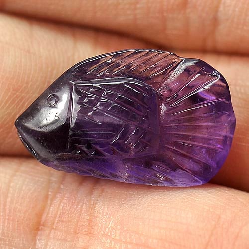 Natural Violet Amethyst 13.20 Ct. Fish Carving Shape 22 x 13.7 Mm Gemstone From Brazil: Product ID: 810303836 Product Name: Natural Amethyst Weight: 13.20 CT. Size: 22 x 13.7 x 8 MM. Shape: Fish Carving Color: Violet Clarity:Semi - Transparent Luster: Good Gems Origin: Brazil Treatment: 