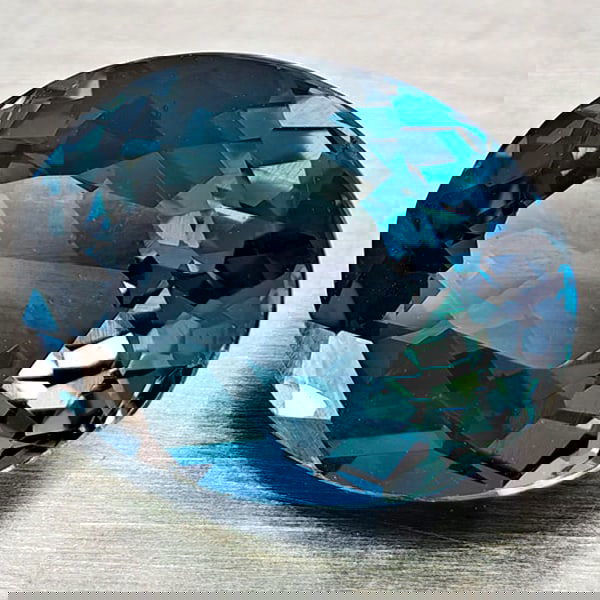Natural London Blue Topaz 3.11 Ct. Oval Shape 10 x 7.7 Mm Gemstone From Brazil: Product ID: 807168406 Product Name: Natural Blue Topaz Weight: 3.11 CT. Size: 10 x 7.7 x 5.2 MM. Shape: Oval Color: London Blue Clarity:VVS - VSI Luster: Very Good Gems Origin: Brazil Treatment: Treat