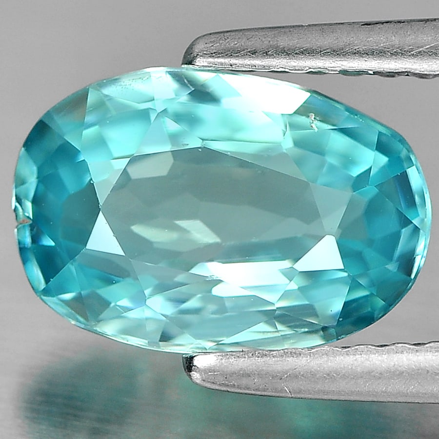 Natural Blue Zircon 2.52 Ct. Oval Shape 9.8 x 6.8 Mm Gemstone From Cambodia: Product ID: 807720678 Product Name: Natural Zircon Weight: 2.52 CT. Size: 9.8 x 6.8 x 3.6 MM. Shape: Oval Color: Blue Clarity:VSI Luster: Good Gems Origin: Cambodia Treatment: Heated Crystal Structure