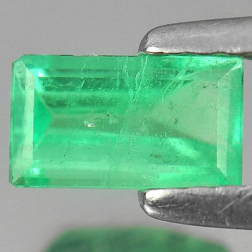 Natural Green Emerald 0.50 Ct.Octagon Shape 6.4 x 3.7 Mm. Gemstone From Columbia: Product ID: 802402202 Product Name: Natural Emerald Weight: 0.50 CT. Size: 6.4 x 3.7 x 2.7 MM. Shape: Octagon Color: Green Clarity:VSI Luster: Good Gems Origin: Columbia Treatment: Unheated Crystal St