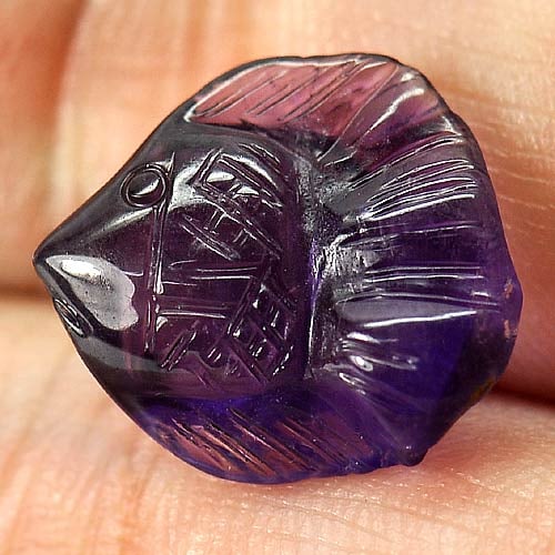 Natural Purple Amethyst 6.47 Ct. Fish Carving Size 15 x 12.8 Mm. Gemstone From Brazil: Product ID: 810303826 Product Name: Natural Amethyst Weight: 6.47 CT. Size: 15 x 12.8 x 7.2 MM. Shape: Fish Carving Color: Purple Clarity:Semi - Transparent Luster: Good Gems Origin: Brazil Treatment: