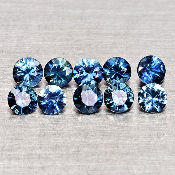 Natural Blue Sapphire 0.88 Ct. 10 Pcs. Round Diamond Cut 2.7 Mm. Gemstones From Madagascar: Product ID: 806162637 Product Name: Natural Blue Sapphire Weight: 0.88 CT. Size: 2.7 x 2.7 x 1.6 MM. Shape: Round Diamond Cut Color: Blue Clarity:VVS Luster: Good Gems Origin: Madagascar Treatment: He