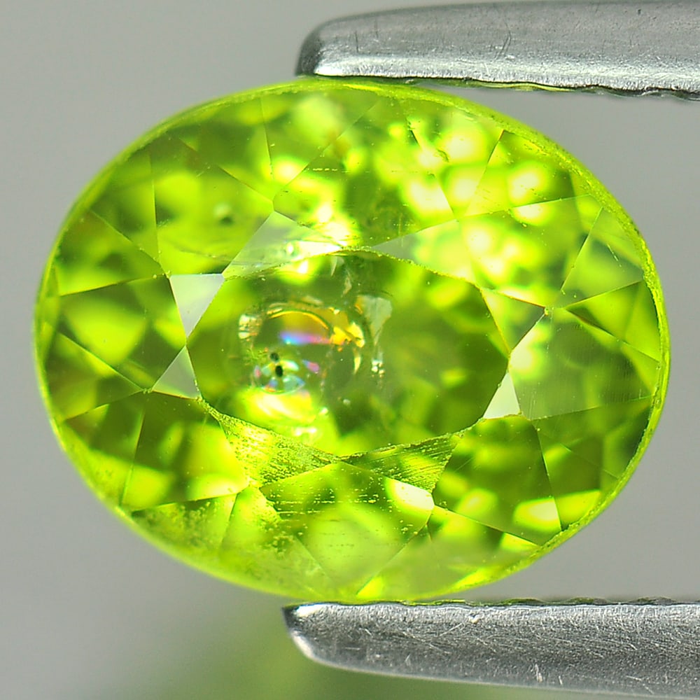 Natural Green Peridot 2.12 Ct. Oval Shape 8.3 x 6.8 Mm. Gemstone From China: Product ID: 805310052 Product Name: Natural Peridot Weight: 2.12 CT. Size: 8.3 x 6.8 x 5.4 MM. Shape: Oval Color: Green Clarity:SI Luster: Good Gems Origin: China Treatment: Unheated Crystal Structure