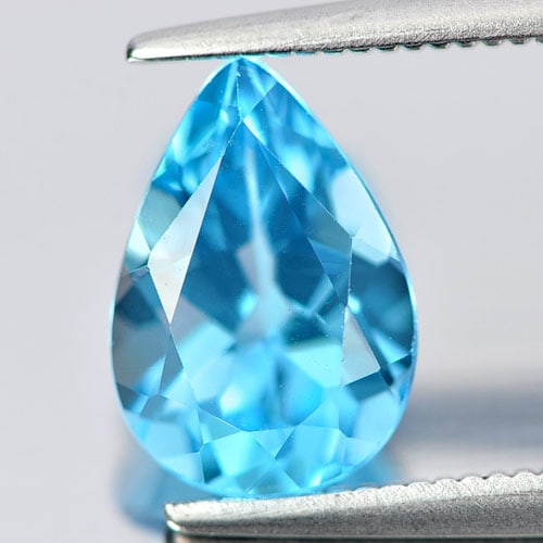 Natural Swiss Blue Topaz 2.40 Ct. Pear Shape 10.1 x 7 Mm Gemstone From Brazil: Product ID: 807158088 Product Name: Natural Blue Topaz Weight: 2.40 CT. Size: 10.1 x 7 x 5.1 MM. Shape: Pear Color: Swiss Blue Clarity:VSI Luster: Good Gems Origin: Brazil Treatment: Treated Crystal S