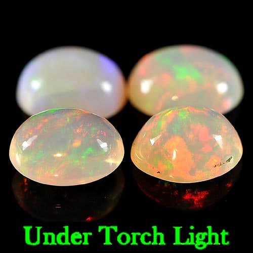 Natural Multi-Color Opal 3.40 Ct.Oval Cabochon Shape 4 Pcs. 7.9 x 6.2 Mm. Unheated Gemstone: Product ID: 818723274 Product Name: Natural Opal Weight: 3.40 CT. Size: 7.9 x 6.2 x 4 MM. Shape: Oval Cabochon Color: Multi Color Clarity:Semi - Transparent Luster: Good Gems Origin: Ethiopia Treatmen
