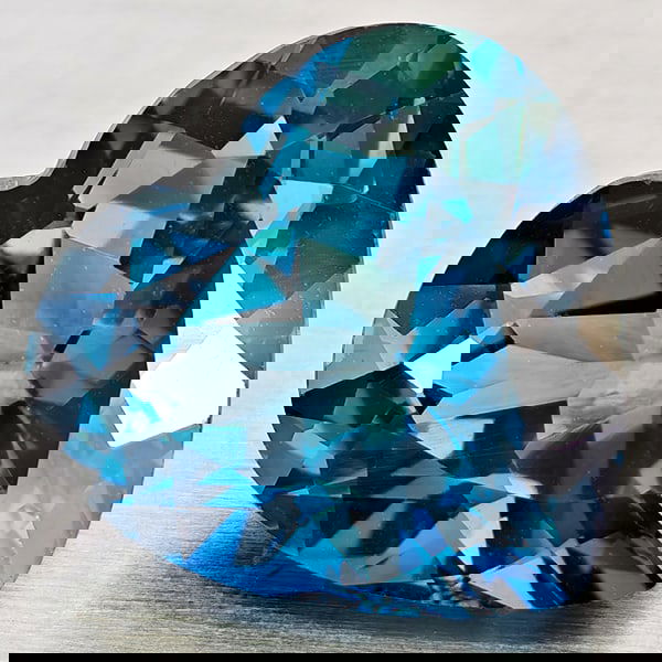 Natural London Blue Topaz 4.47 Ct. Heart Shape 10.5 x 10 Mm Gemstone From Brazil: Product ID: 807168374 Product Name: Natural Blue Topaz Weight: 4.47 CT. Size: 10.5 x 10 x 6.4 MM. Shape: Heart Shape Color: London Blue Clarity:VVS - VSI Luster: Good Gems Origin: Brazil Treatment: Tr