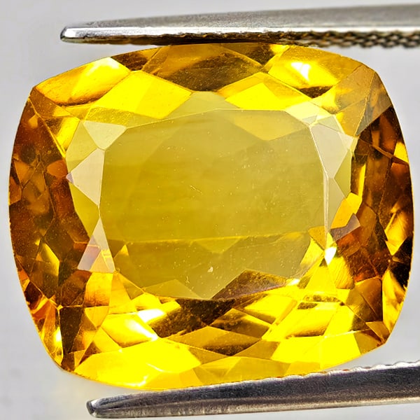 Natural Yellow Citrine 10.79 Ct. Cushion Shape 15.7 x 13.8 Mm Gemstone From Brazil: Product ID: 801815343 Product Name: Natural Citrine Weight: 10.79 CT. Size: 15.7 x 13.8 x 7.5 MM. Shape: Cushion Shape Color: Yellow Clarity:VSI Luster: Good Gems Origin: Brazil Treatment: Unheated Cr