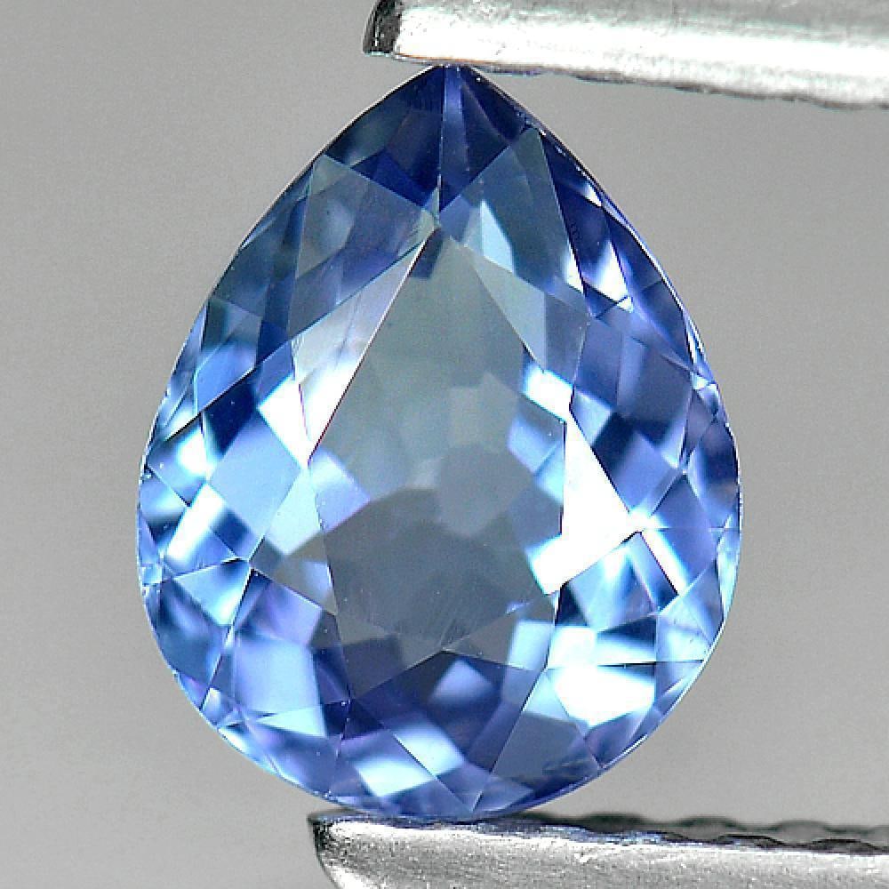 Natural Blue Tanzanite 0.74 Ct. Clean Pear Shape 6.9 x 5.4 Mm. Gemstone From Tanzania: Product ID: 807004459 Product Name: Natural Tanzanite Weight: 0.74 CT. Size: 6.9 x 5.4 x 3.1 MM. Shape: Pear Color: Blue Clarity:IF Luster: Very Good Gems Origin: Tanzania Treatment: Heated Crystal St