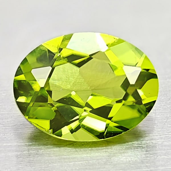 Natural Green Peridot 1.27 Ct. VVS. Oval Shape 8 x 6 Mm. Gemstone From Pakistan: Product ID: 805316969 Product Name: Natural Peridot Weight: 1.27 CT. Size: 8 x 6 x 3.6 MM. Shape: Oval Color: Green Clarity:VVS Luster: Good Gems Origin: Pakistan Treatment: Unheated Crystal Structure