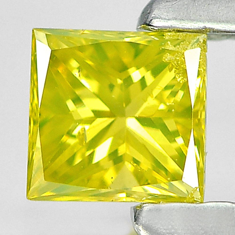 Natural Yellow Diamond 0.22 Ct. Square Princess Cut 3.4 Mm From Belgium: Product ID: 802103799 Product Name: Natural Enhanced Diamond Weight: 0.22 CT. Size: 3.4 x 3.4 x 2.3 MM. Shape: Square Princess Cut Color: Yellow Clarity:SI1 Luster: Good Gems Origin: Belgium Treatment