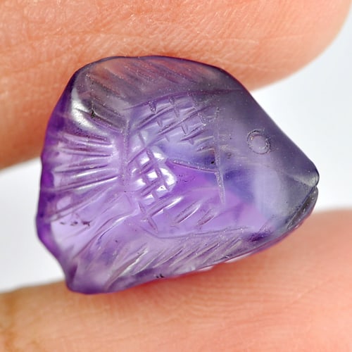Natural Purple Amethyst 6.69 Ct. Fish Carving 15.3 x 11.7 Mm. Gemstone From Brazil: Product ID: 810302711 Product Name: Natural Amethyst Weight: 6.69 CT. Size: 15.3 x 11.7 x 6.9 MM. Shape: Fish Carving Color: Purple Clarity:Semi - Transparent Luster: Good Gems Origin: Brazil Treatmen