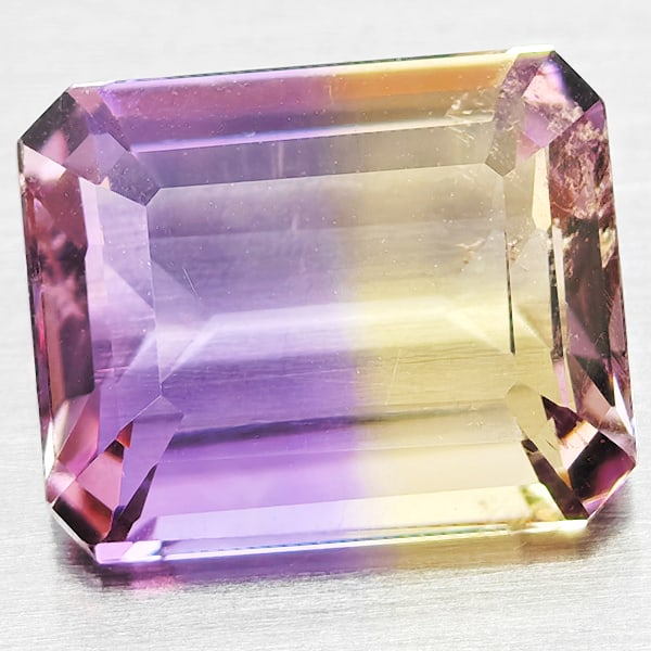 Natural Bi Color Ametrine 2.84 Ct. Octagon Shape 9.8 x 8 Mm Gemstone From Bolivia: Product ID: 800408435 Product Name: Natural Ametrine Weight: 2.84 CT. Size: 9.8 x 8 x 4.6 MM. Shape: Octagon Color: Bi Color Clarity:VSI Luster: Good Gems Origin: Bolivia Treatment: Unheated Crystal S