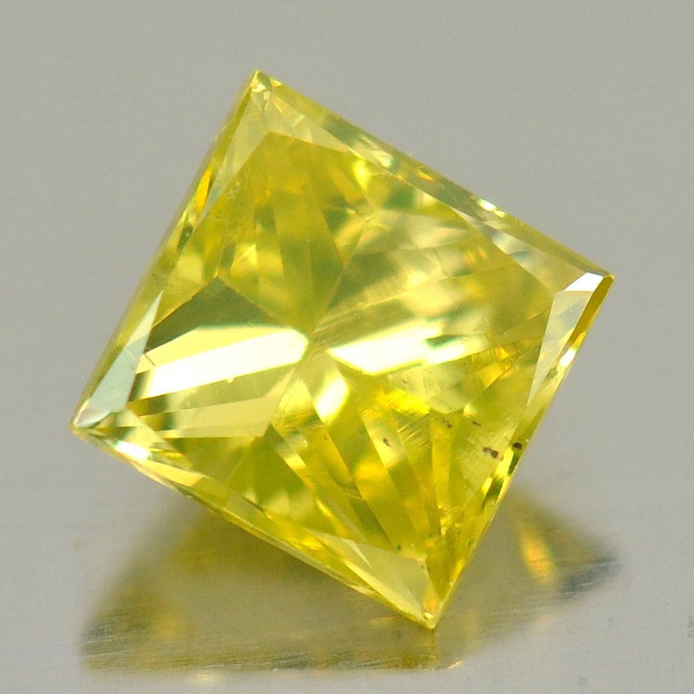 Natural Yellow Diamond 0.22 Ct. Square Princess Cut 3.3 x 3.2 x 2.3 Mm.: Product ID: 802103781 Product Name: Natural Enhanced Diamond Weight: 0.22 CT. Size: 3.3 x 3.2 x 2.3 MM. Shape: Square Princess Cut Color: Yellow Clarity:SI1 Luster: Scintillating Gems Origin: Belgium