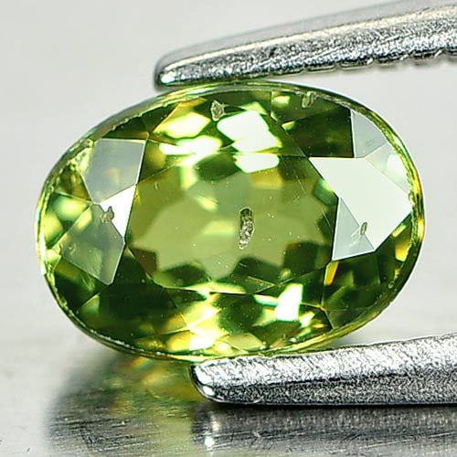 Natural Green Demantoid Garnet 1.02 Ct. Oval Shape 6.7 x 4.8 Mm. Gemstone Unheated From Madagascar: Product ID: 802931399 Product Name: Natural Demantoid Weight: 1.02 CT. Size: 6.7 x 4.8 x 3.5 MM. Shape: Oval Color: Green Clarity:SI1 Luster: Very Good Gems Origin: Madagascar Treatment: Unheated Crys