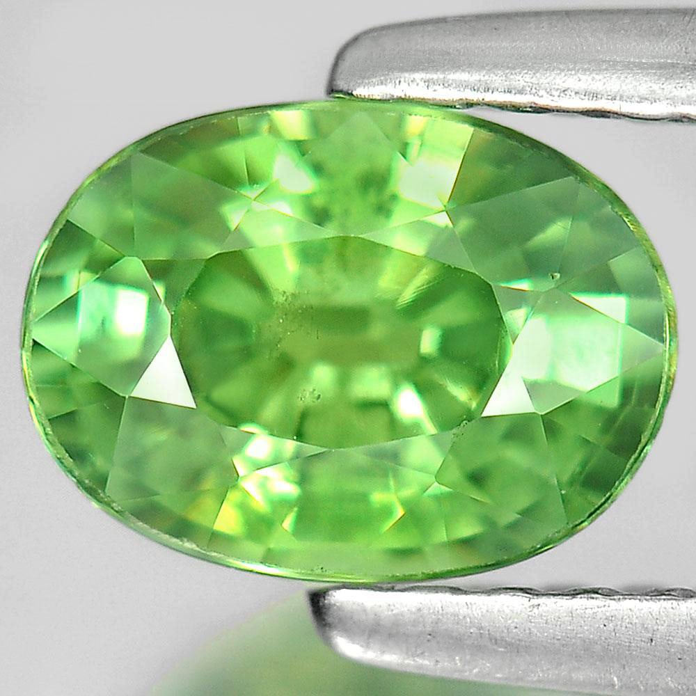 Natural Green Demantoid Garnet 1.10 Ct. Oval Shape 7 x 5.1 Mm. Unheated Gemstone From Madagascar: Product ID: 802929777 Product Name: Natural Demantoid Weight: 1.10 CT. Size: 7 x 5.1 x 3.5 MM. Shape: Oval Color: Green Clarity:VSI Luster: Very Good Gems Origin: Madagascar Treatment: Unheated Crysta