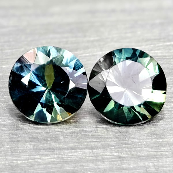 Natural Fancy Color Sapphire 0.33 Ct. 2 Pcs Round Diamand Cut 3.4 Mm Gemstones From Tanzania: Product ID: 806162245 Product Name: Natural Green Sapphire Weight: 0.33 CT. Size: 3.4 x 3.4 x 2.1 MM. Shape: Round Diamond Cut Color: Fancy Color Clarity:VSI Luster: Very Good Gems Origin: Tanzania Tr