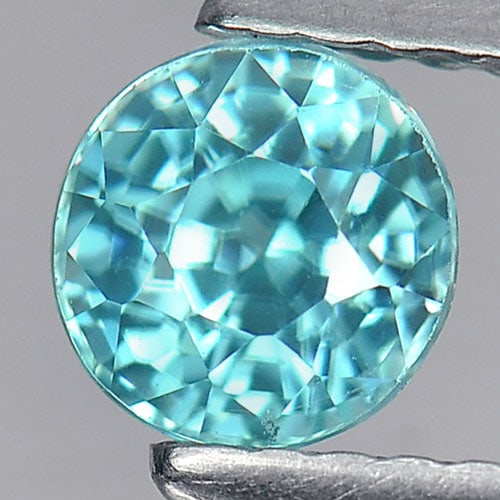 Natural Blue Zircon 1.14 Ct. Round Shape 5.3 Mm. Gemstone From Cambodia: Product ID: 807727523 Product Name: Natural Zircon Weight: 1.14 CT. Size: 5.3 x 5.3 x 4.3 MM. Shape: Round Color: Blue Clarity:VSI Luster: Good Gems Origin: Cambodia Treatment: Heated Crystal Structur