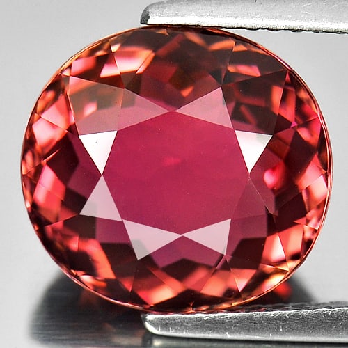 Natural Orangish Pink Tourmaline 6.64 Ct. Clean Oval Shape 12.1 x 11.2 Mm. Unheated Gemstone From: Product ID: 807242719 Product Name: Natural Tourmaline Weight: 6.64 CT. Size: 12.1 x 11.2 x 6.9 MM. Shape: Oval Color: Orangish Pink Clarity:IF Luster: Very Good Gems Origin: Nigeria Treatment: Unheat