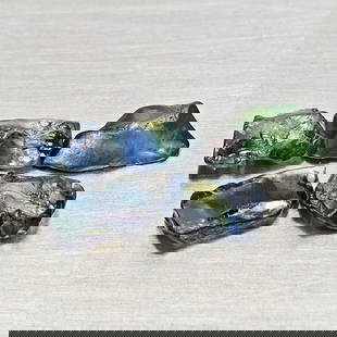 Natural Multi Color Sapphire Rough 4.22 Ct. 5 Pcs. Unheated Gemstones From Madagascar: Product ID: 806162546 Product Name: Natural Green Sapphire Weight: 4.22 CT. Size: 6.7 x 4.2 x 2.9 to 9.2 x 3.2 x 4.1 MM. Shape: Rough Mixed Shape Color: Greenish Blue Clarity:VSI Luster: Good Gems Ori