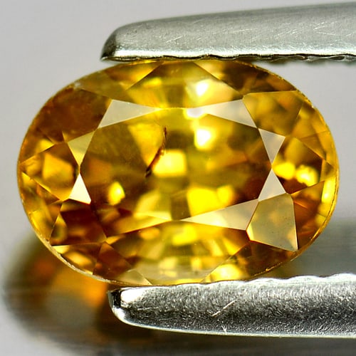 Natural Yellow Zircon 1.58 Ct. Oval Shape 7 x 5 Mm. Gemstone From Cambodia: Product ID: 807727255 Product Name: Natural Zircon Weight: 1.58 CT. Size: 7 x 5 x 4.2 MM. Shape: Oval Color: Yellow Clarity:SI Luster: Good Gems Origin: Cambodia Treatment: Heated Crystal Structure: T