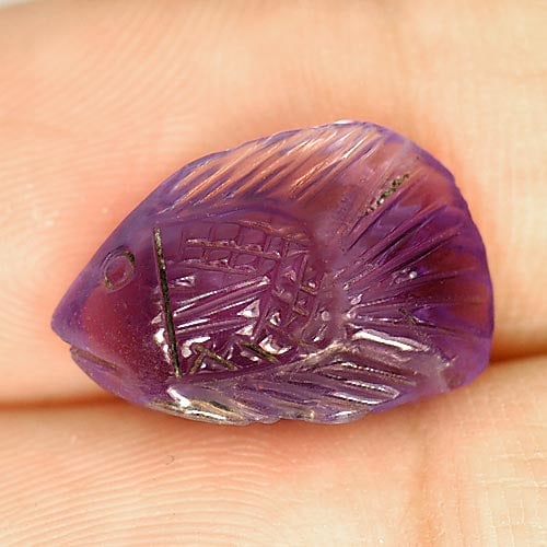 Natural Purple Amethyst 5.17 Ct. Fish Carving Size 16 x 10.5 Mm Gemstone From Brazil: Product ID: 810303487 Product Name: Natural Amethyst Weight: 5.17 CT. Size: 16 x 10.5 x 5.6 MM. Shape: Fish Carving Color: Purple Clarity:Semi - Transparent Luster: Good Gems Origin: Brazil Treatment: