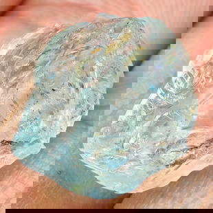 Natural Baby Blue Green Aquamarine 11.27 Ct. Rough Shape 15 x 12.5 Mm Gemstone from Brazil: Product ID: 590800005 Product Name: Natural Aquamarine Weight: 11.27 CT. Size: 15 x 12.5 x 9 MM. Shape: Rough Mixed Shape Color: Baby Blue Green Clarity:None Luster: Good Gems Origin: Brazil Treatment