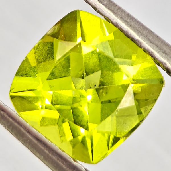 Natural Green Peridot 1.58 Ct. Cushion Shape 7 Mm Gemstone From Pakistan: Product ID: 805317212 Product Name: Natural Peridot Weight: 1.58 CT. Size: 7 x 7 x 4.5 MM. Shape: Cushion Shape Color: Green Clarity:VSI - SI1 Luster: Good Gems Origin: Pakistan Treatment: Unheated Cr