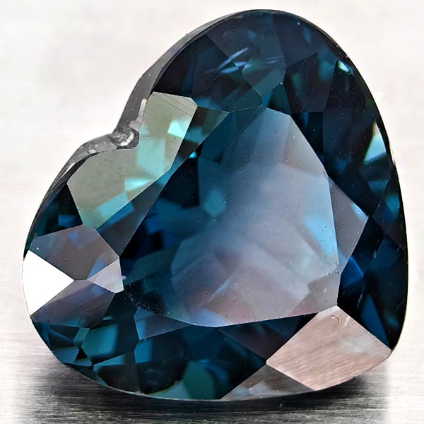 Natural London Blue Topaz 3.82 Ct. Heart Shape 10.7 x 9.4 Mm Gemstone From Brazil: Product ID: 807168354 Product Name: Natural Blue Topaz Weight: 3.82 CT. Size: 10.7 x 9.4 x 6.1 MM. Shape: Heart Shape Color: London Blue Clarity:VVS - VSI Luster: Good Gems Origin: Brazil Treatment: T