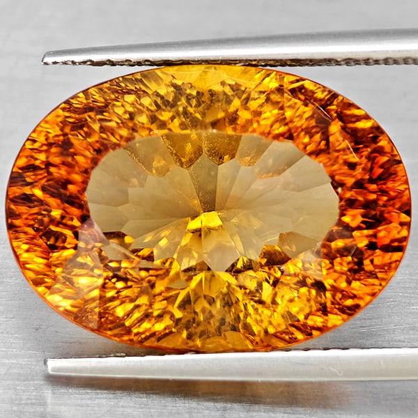 Natural Imperial Topaz 17.26 Ct. Oval Concave Cut 18.1 x 12.9 Mm Gemstone From Barzil: Product ID: 807168618 Product Name: Natural Topaz Weight: 17.26 CT. Size: 18.1 x 12.9 x 10 MM. Shape: Oval Shape Color: Imperial Clarity:VSI Luster: Good Gems Origin: Brazil Treatment: Treated Crystal