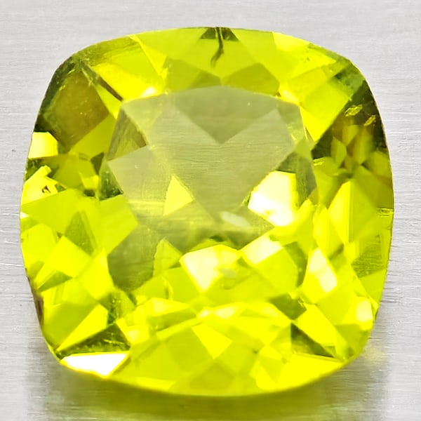 Natural Green Peridot 1.33 Ct. Cushion Shape 7.1 Mm Gemstone From Pakistan: Product ID: 805317213 Product Name: Natural Peridot Weight: 1.33 CT. Size: 7.1 x 7.1 x 3.1 MM. Shape: Cushion Shape Color: Green Clarity:VSI - SI1 Luster: Good Gems Origin: Pakistan Treatment: Unheate