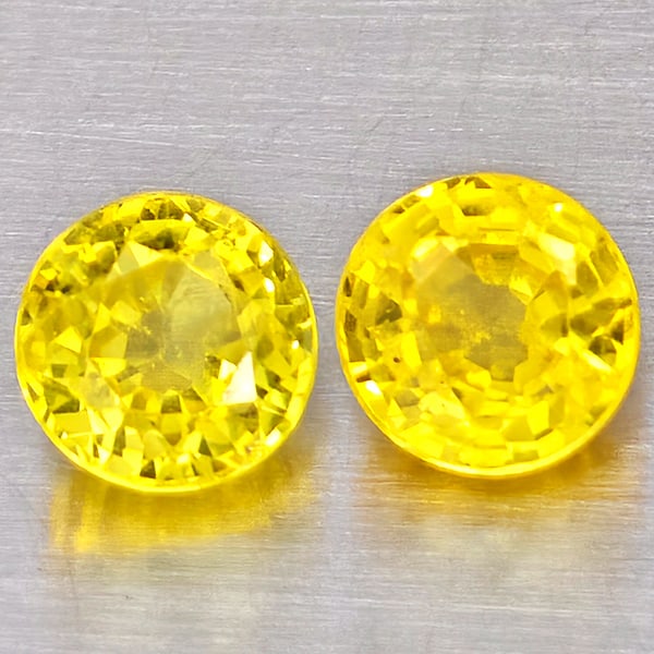 Natural Yellow Sapphire 0.80 Ct. 2 Pcs Round Shape 4.3 Mm Gemstones From Thailand: Product ID: 806162915 Product Name: Natural Yellow Sapphire Weight: 0.80 CT. Size: 4.3 x 4.3 x 3 MM. Shape: Round Shape Color: Yellow Clarity:VSI Luster: Good Gems Origin: Thailand Treatment: Heated C