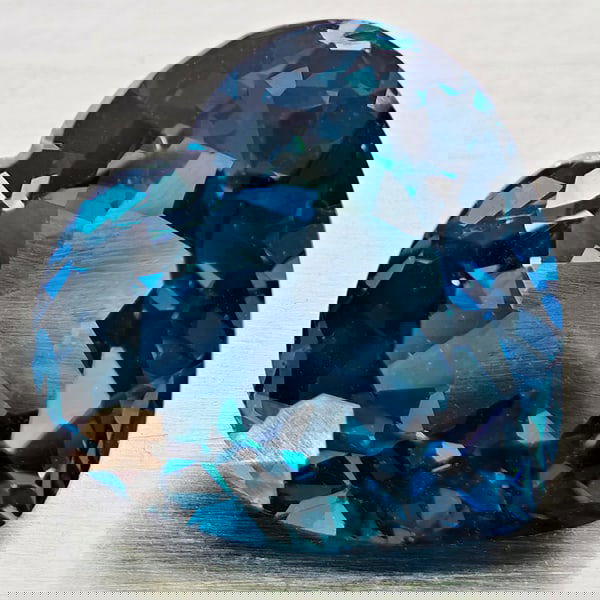 Natural London Blue Topaz 5.11 Ct. Heart Shape 11.4 x 10.2 Mm Gemstone From Brazil: Product ID: 807168380 Product Name: Natural Blue Topaz Weight: 5.11 CT. Size: 11.4 x 10.2 x 6.5 MM. Shape: Heart Shape Color: London Blue Clarity:VVS - VSI Luster: Good Gems Origin: Brazil Treatment: