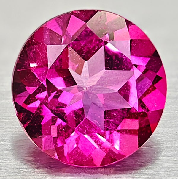 Natural Pink Topaz 2.35 Ct. Clean Round Shape 8.1 Mm Gemstone From Brazil: Product ID: 807167850 Product Name: Natural Topaz Weight: 2.35 CT. Size: 8.1 x 8.1 x 5 MM. Shape: Round Color: Pink Clarity:IF Luster: Very Good Gems Origin: Brazil Treatment: Treated Crystal Structur