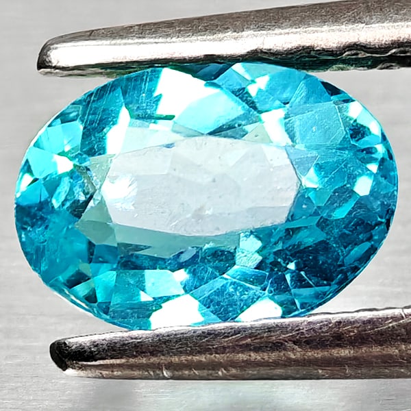 Natural Paraiba Color Apatite 0.76 Ct. Oval Shape 6.9 x 5 Mm. Gemstones From Tanzania: Product ID: 800613710 Product Name: Natural Apatite Weight: 0.76 CT. Size: 6.9 x 5 x 3.2 MM. Shape: Oval Color: Neon Blue Clarity:VSI Luster: Good Gems Origin: Tanzania Treatment: Unheated Crystal Str