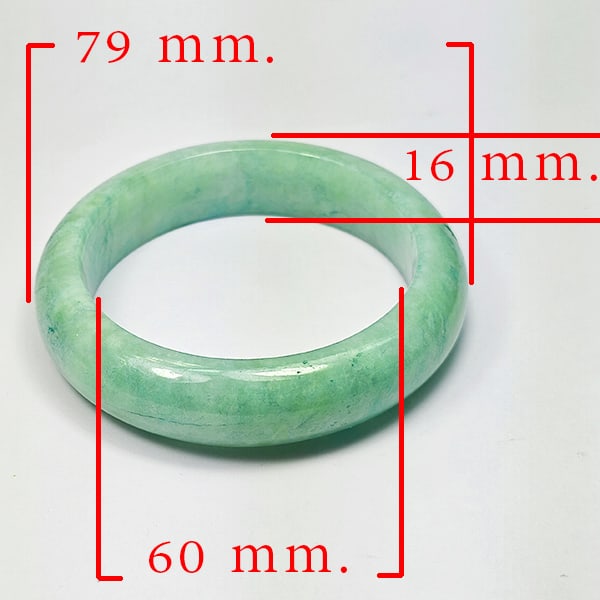 Natural Green Jade Bangle 428.51 Ct. Diameter 60 Mm. Unheated Gemstone: Product ID: 819816012 Product Name: Natural Jade Weight: 428.51 CT. Size: 79 x 60 x 16 MM. Shape: Bangle Round Cabochon Color: Multi-Color Green Clarity:Opaque Luster: Good Gems Origin: Thailand Treat