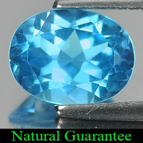 Natural Swiss Blue Topaz 2.21 Ct Oval Shape 9 x 7 Mm Gemstone From Brazil: Product ID: 807161394 Product Name: Natural Blue Topaz Weight: 2.21 CT. Size: 9 x 7 x 4.7 MM. Shape: Oval Color: Swiss Blue Clarity:VSI Luster: Good Gems Origin: Brazil Treatment: Treated Crystal Stru