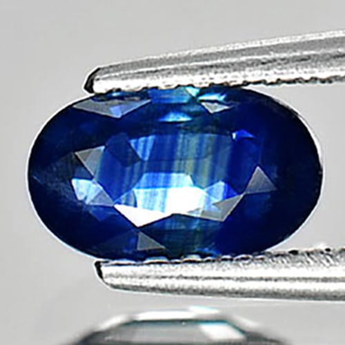 Natural Blue Sapphire 0.78 Ct. Oval Shape 7.1 x 4.3 Mm. Gemstone From Thailand: Product ID: 806008555 Product Name: Natural Blue Sapphire Weight: 0.78 CT. Size: 7.1 x 4.3 x 2.5 MM. Shape: Oval Color: Blue Clarity:VSI Luster: Good Gems Origin: Thailand Treatment: Heated Crystal St