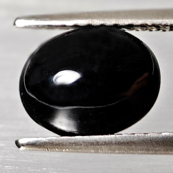 Natural Black Spinel 2.50 Ct. Oval Cabochon Shape 9.1 x 7.1 Mm Gemstone From Thailand: Product ID: 806609900 Product Name: Natural Spinel Weight: 2.50 CT. Size: 9.1 x 7.1 x 3.9 MM. Shape: Oval Cabochon Color: black Clarity:Opaque Luster: Good Gems Origin: Thailand Treatment: Unheated Cr