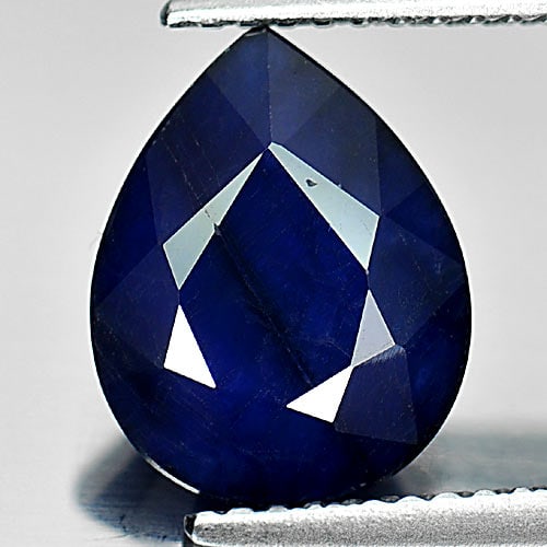 Natural Deep Blue Diffusion Sapphire 3.39 Ct. Pear Shape 11 x 8.7 Mm Gemstone From Madagascar: Product ID: 806011538 Product Name: Natural Blue Sapphire Weight: 3.39 CT. Size: 11 x 8.7 x 4.7 MM. Shape: Pear Color: Deep Blue Clarity:Opaque Luster: Good Gems Origin: Madagascar Treatment: Diffusio