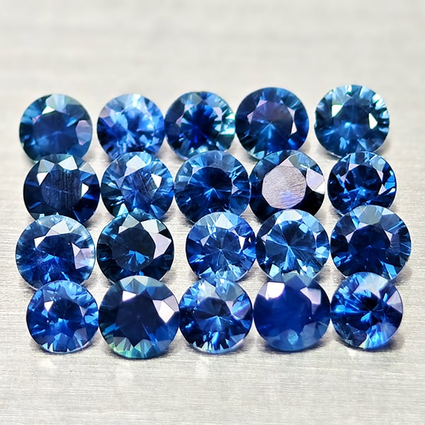 Natural Blue Sapphire 1.20 Ct. 20 Pcs Round Diamond Cut 2.5 Mm Gemstones from Madagascar: Product ID: 806012190 Product Name: Natural Blue Sapphire Weight: 1.20 CT. Size: 2.5 x 2.5 x 1.7 MM. Shape: Round Diamond Cut Color: Blue Clarity:VSI Luster: Good Gems Origin: Madagascar Treatment: He