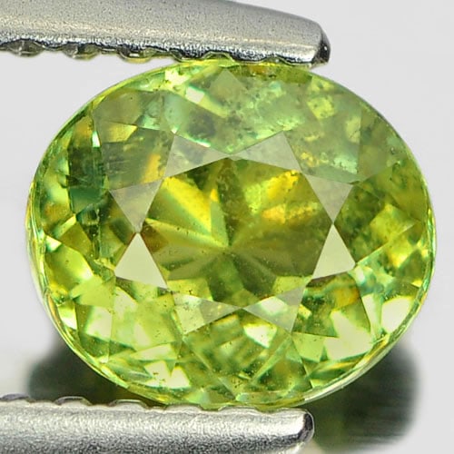 Natural Green Demantoid Garnet 1.00 Ct. Oval Shape 6.3 x 5.4 Mm. Gemstone From Madagascar: Product ID: 802922054 Product Name: Natural Demantoid Weight: 1.00 CT. Size: 6.3 x 5.4 x 3.7 MM. Shape: Oval Color: Green Clarity:SI Luster: Very Good Gems Origin: Madagascar Treatment: Unheated Cryst