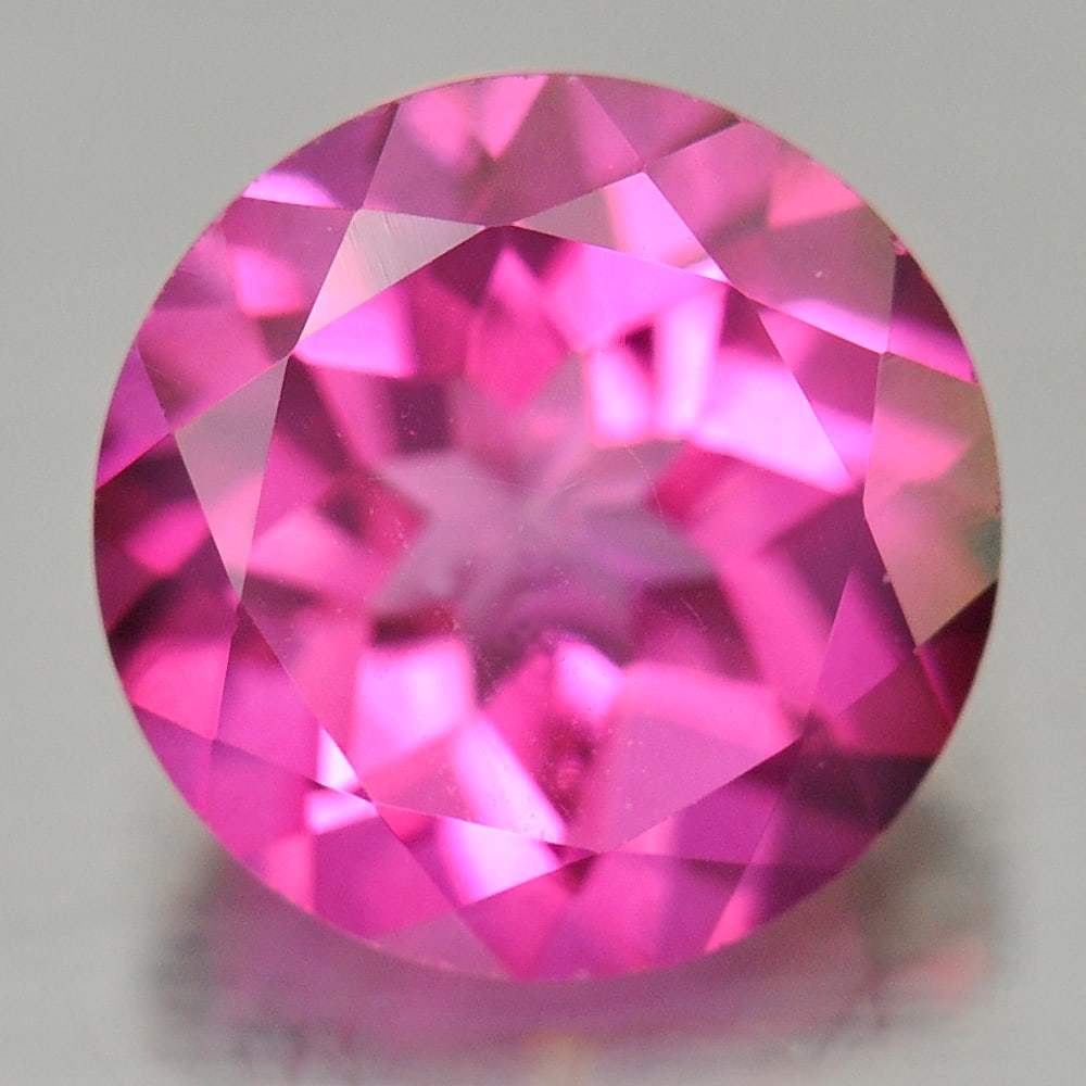 Natural Pink Topaz 2.33 Ct. VVS Round Shape Size 8.1 Mm. Gemstone From Brazil: Product ID: 807167663 Product Name: Natural Topaz Weight: 2.33 CT. Size: 8.1 x 5.1 MM. Shape: Round Color: Pink Clarity:VVS Luster: Very Good Gems Origin: Brazil Treatment: Treated Crystal Structure: