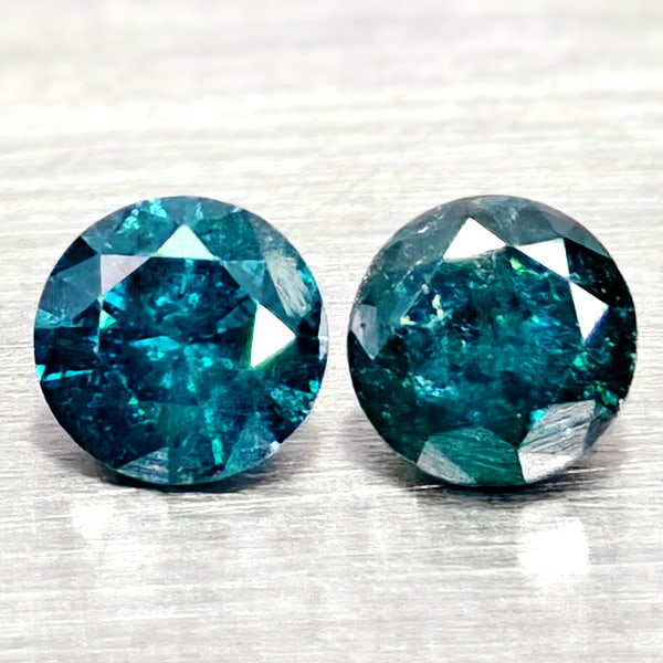 Natural Blue Loose Diamond 0.17 Ct. 2 Pcs Round Diamond Cut 2.9 Mm: Product ID: 502100339 Product Name: Natural Natural Diamond Weight: 0.17 CT. Size: 2.9 x 2.9 x 1.9 MM. Shape: Round Diamond Cut Color: Blue Clarity:SI1 Luster: Good Gems Origin: Belgium Treatment: Tre